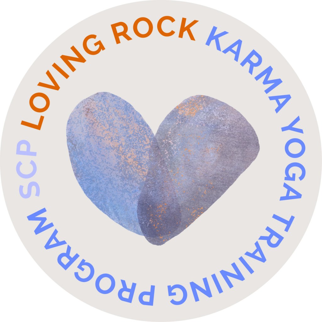 A heart circled by the words, "SCP Loving Rock karma Yoga Training Program."